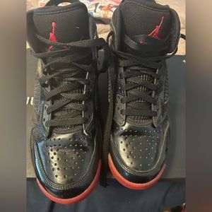 Mike Air Jordan’s Youth Size 6.5. Red and Black Sneakers
